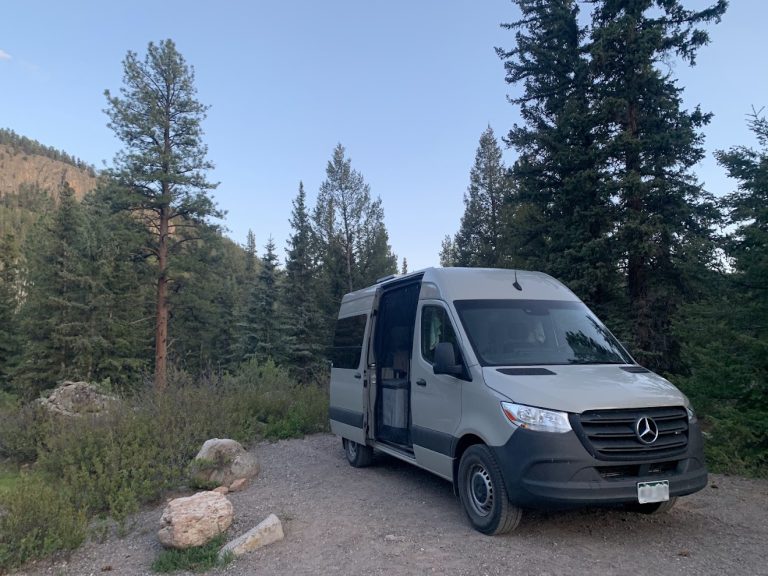 Sprinter Van Parked at Campsite